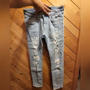 H&M ripped blue jeans